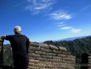 Standing on Mutianyu Great Wall, looking at the grand scenary in the distance and losing in thought, it will be a memorable moment.